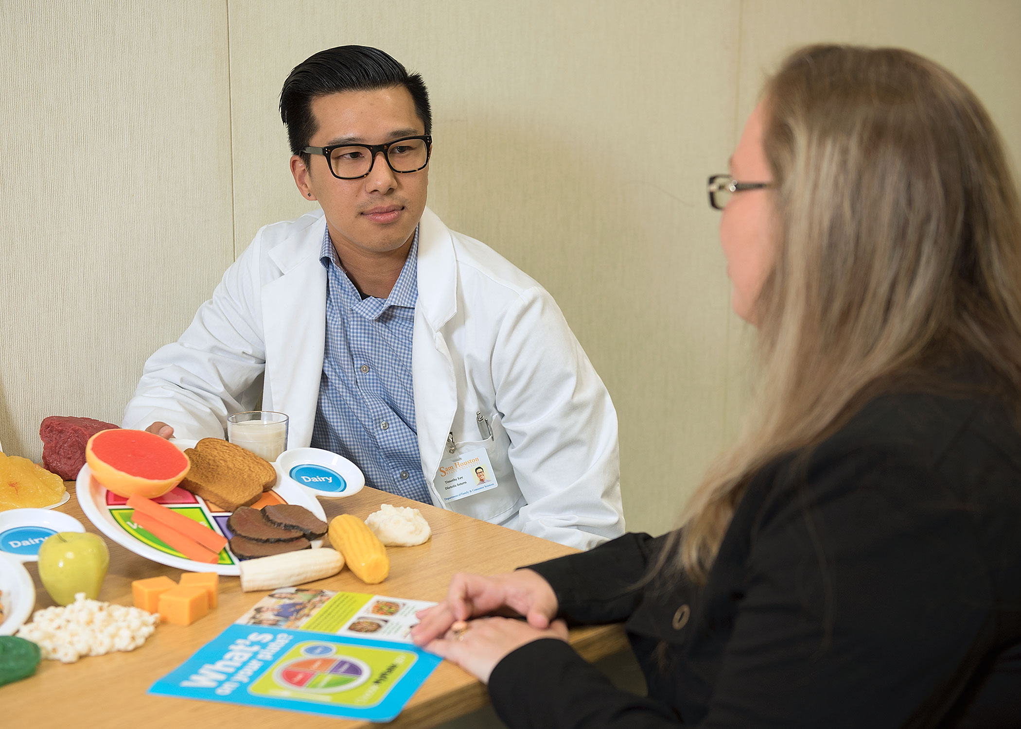 Man and Woman Discussing Food Science and Nutrition