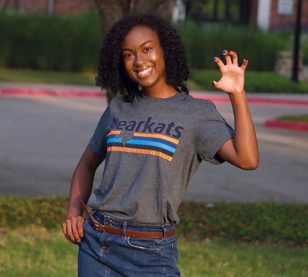 Uri-El Jackson raising a paw on the SHSU grounds.